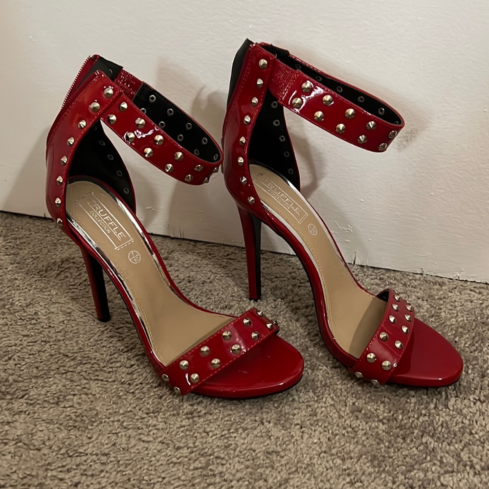 Red spike heels